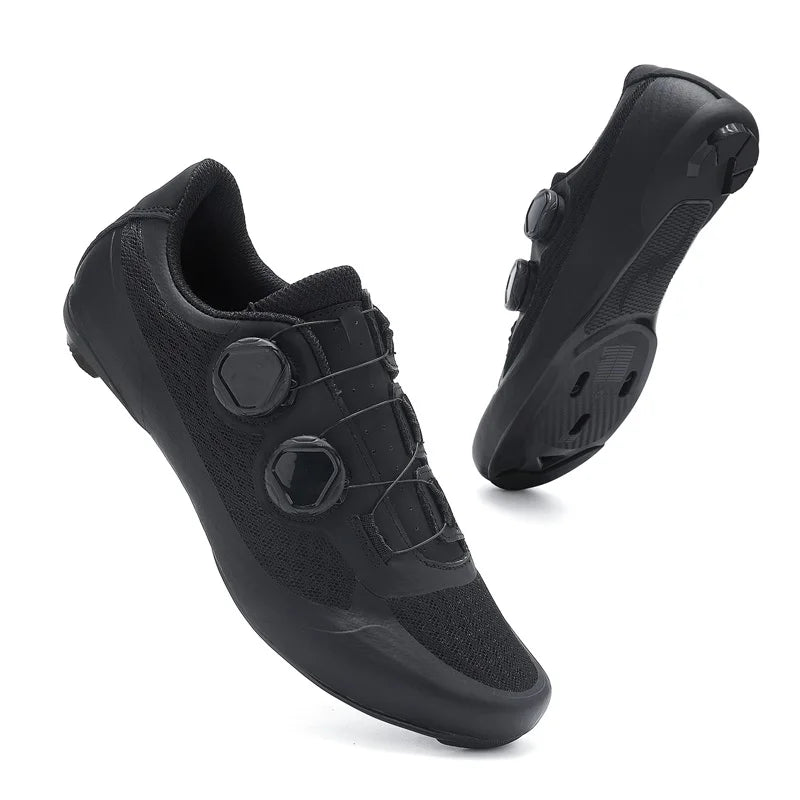Black cycling shoes with a white background