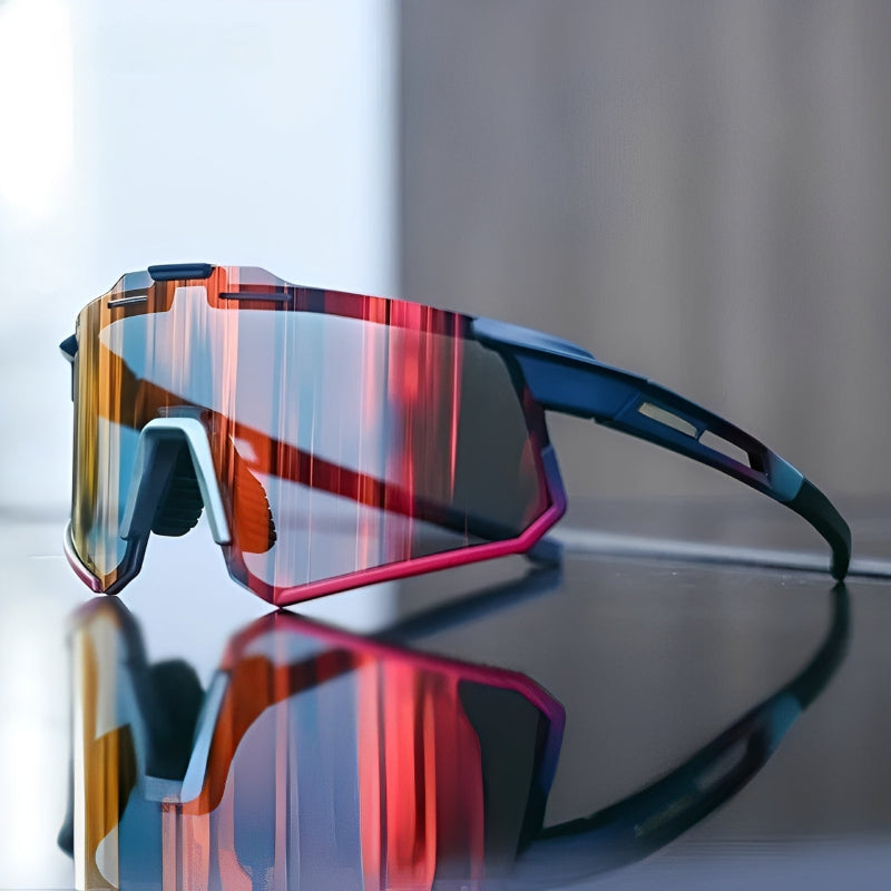 Sunglasses with reflective lenses on a reflective surface