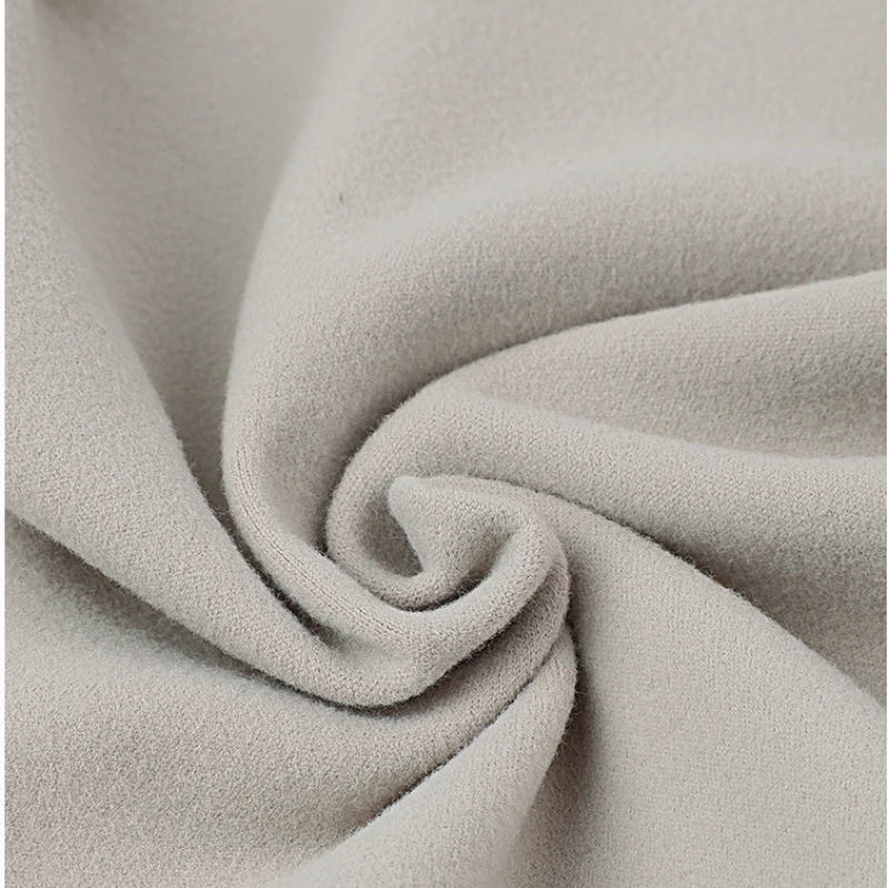 Close-up of beige fabric with a soft texture