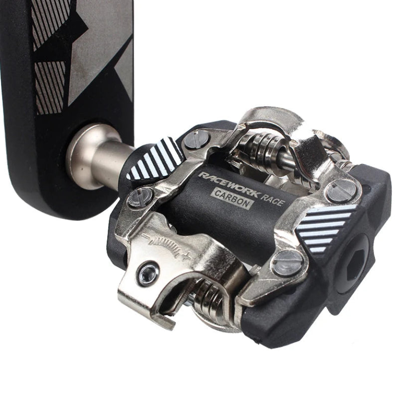 Shimano SPD compatible bicycle pedal clamp with a chrome-molybdenum steel axle, black and silver components, and included lock plate and gaskets on a white background with text overlays.
