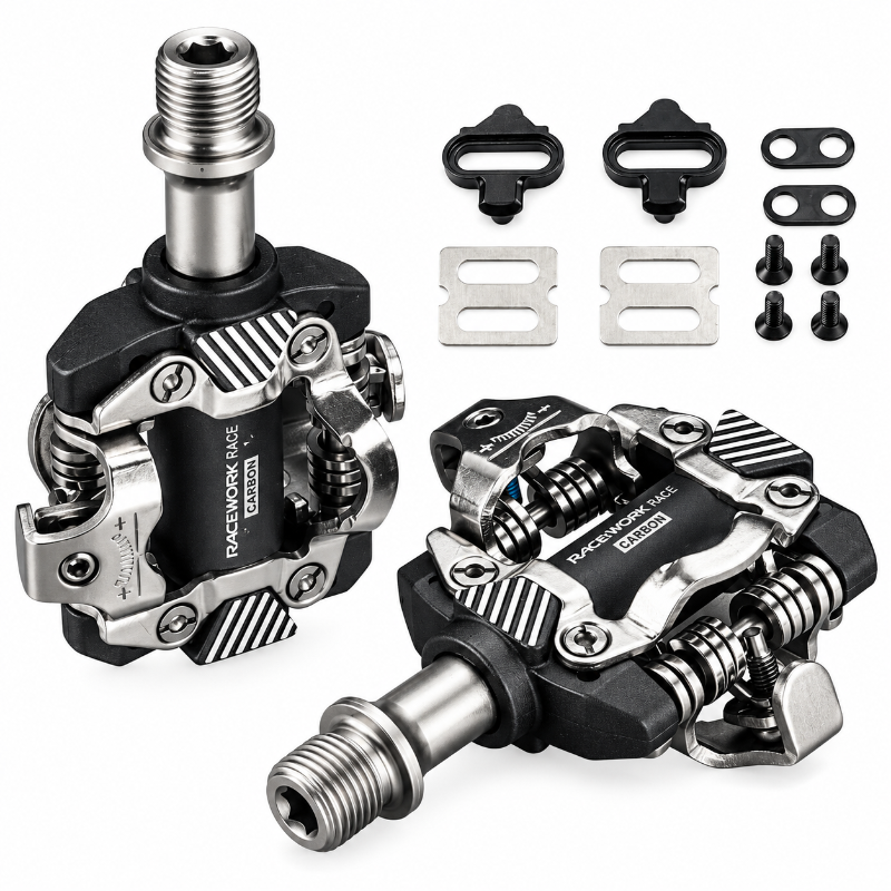 A pair of black and silver RaceWork-Grade cycling pedals with included black cleats, mounting hardware, and silver release buttons on a clean white background.