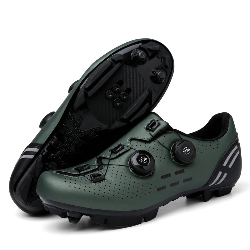 Green cycling shoes with black cleats on a white background