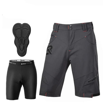 cycling shorts in dark gray with red stitching details, shown alongside a black padded chamois insert and a black cycling brief with a branded waistband on a white background.