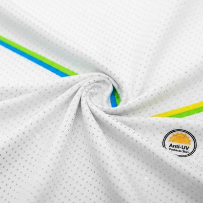 Close-up of a white fabric with green and blue accents and an Anti-UV logo.