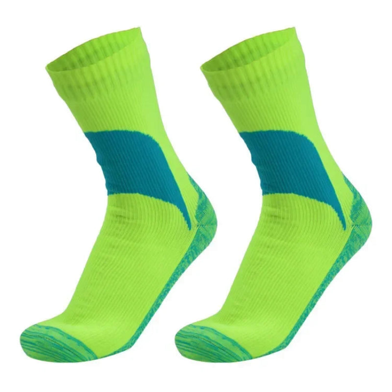 Pair of green socks with blue accents on a white background