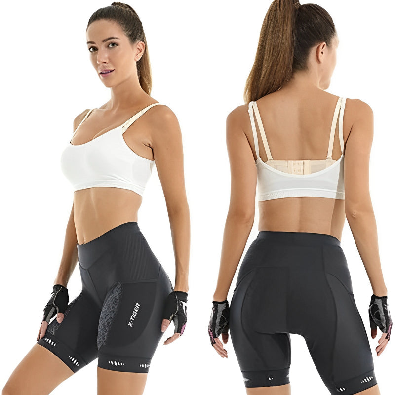 Woman wearing a white sports bra and black leggings with visible branding, shown from front and back.